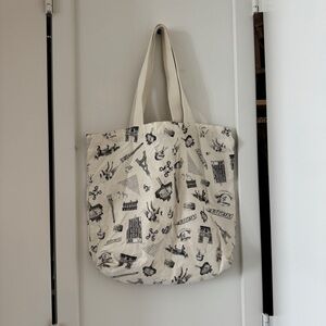 Maison Kitsune. Stylish Cream Tote Bag with Black Print